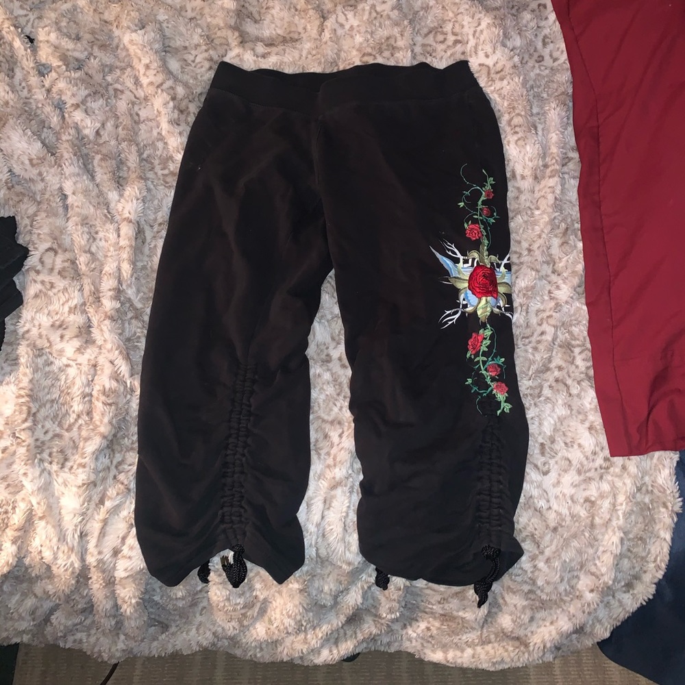 Black sweatpants with floral design